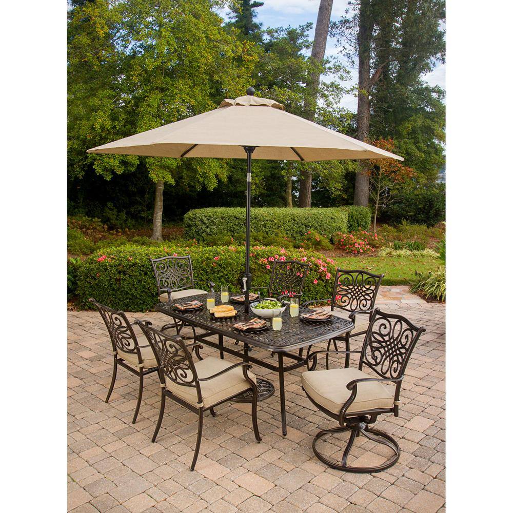 Hanover Traditions 7-Piece Aluminum Outdoor Patio Dining Set and 2 Swivel Chairs, Umbrella and Base with Natural Oat Cushions