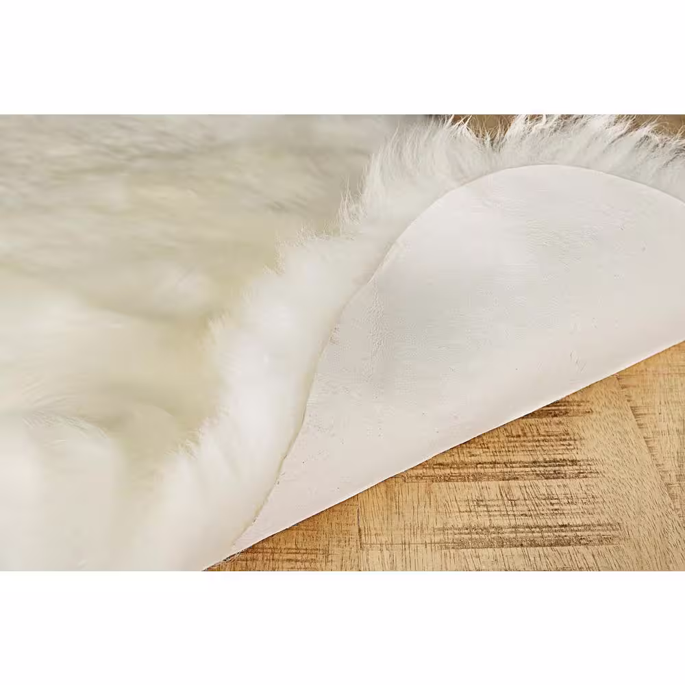 natural New Zealand Natural 4 ft. x 6 ft. Four Sheepskin Area Rug
