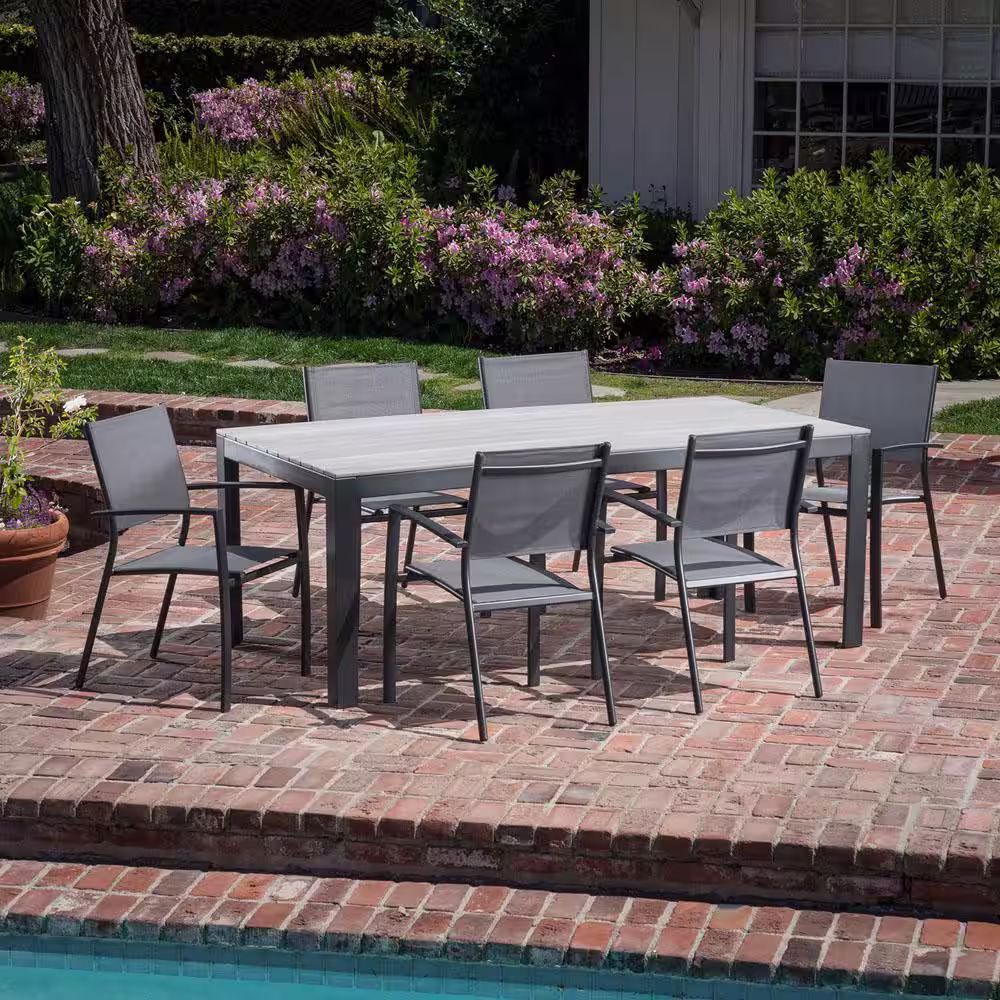 Hanover Tucson 7-Piece Aluminum Outdoor Dining Set with 6-Sling Arm Chairs and a Faux Wood Dining Table