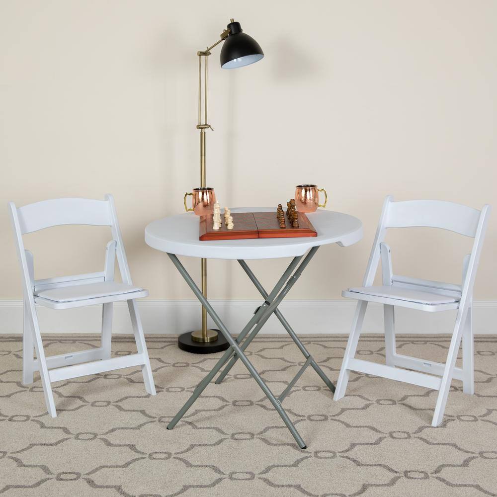 Carnegy Avenue White Vinyl Seat with Resin Frame Folding Chair (Set of 2)
