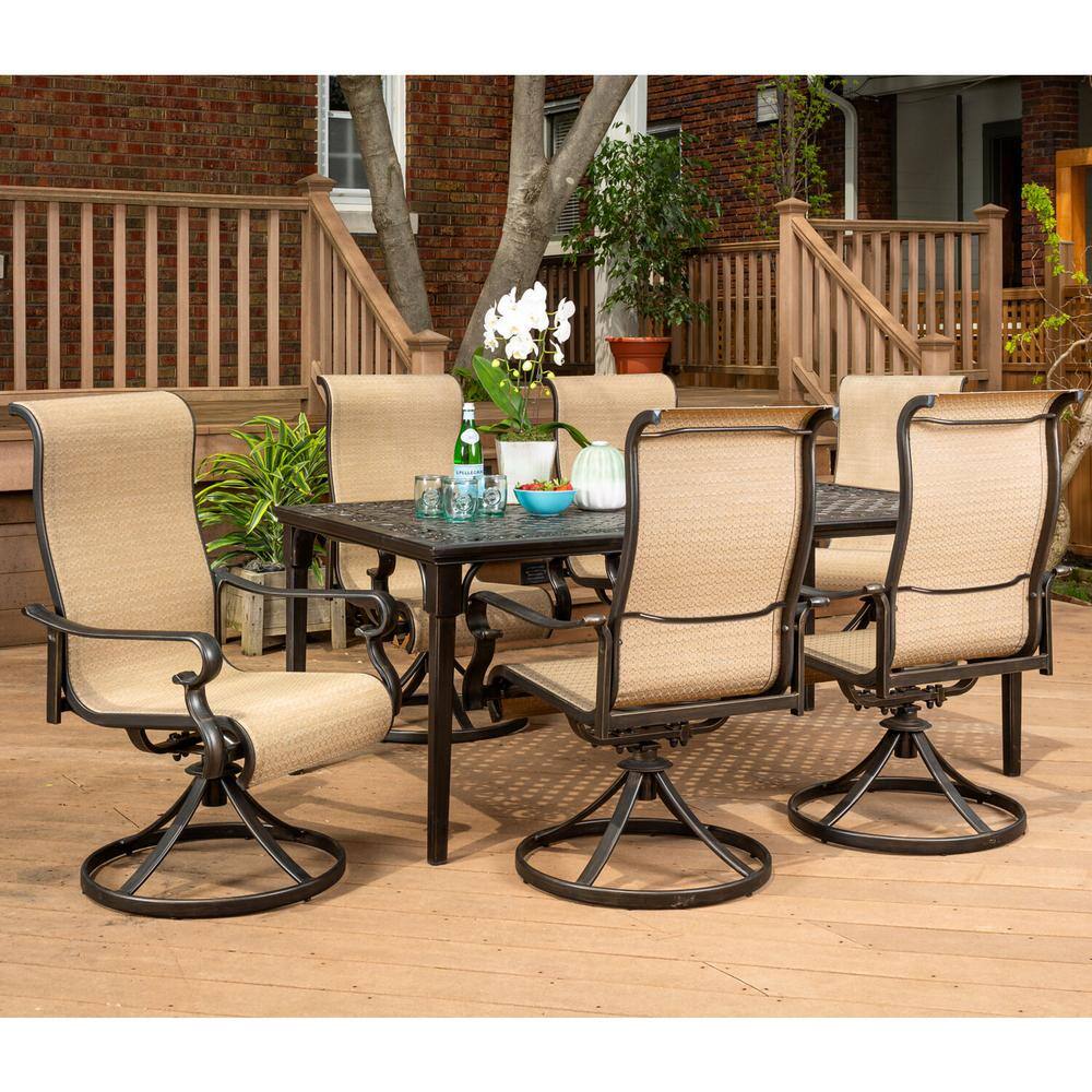 Cambridge Hammond 7-Piece Dining Set with a 70 in. x 40 in. Cast-Top Dining Table and 6 Sling Swivel Rockers
