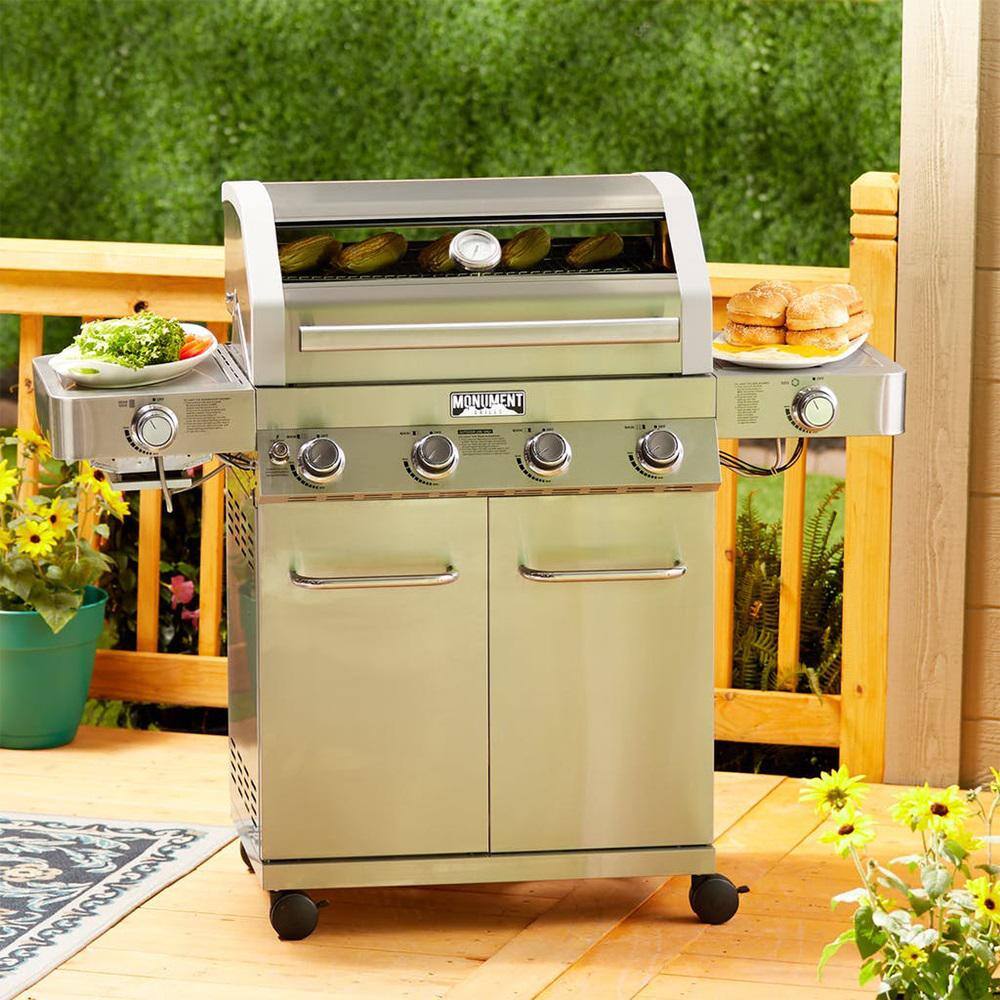 Monument Grills 4-Burner Propane Gas Grill in Stainless with Clear View Lid, LED Controls, Side and Sear Burners