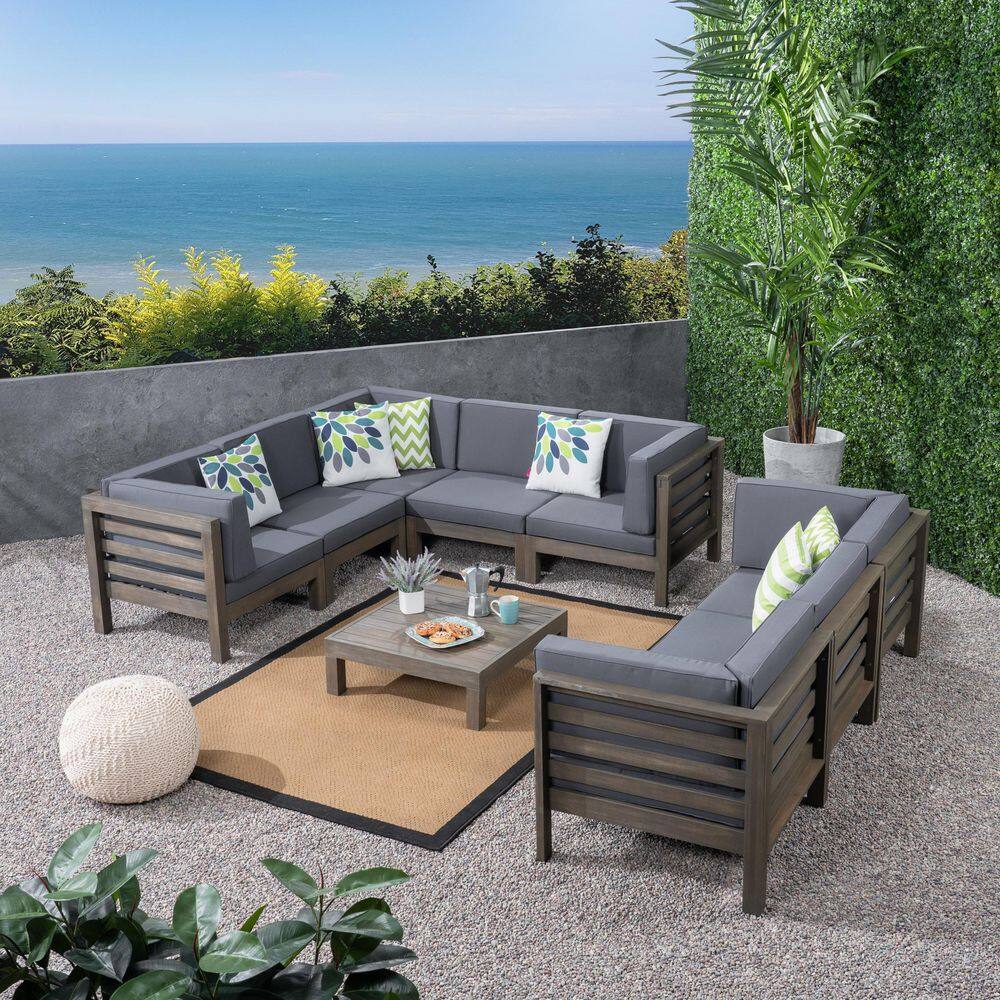 Noble House Oana Grey 9-Piece Wood Patio Conversation Sectional Seating Set with Dark Grey Cushions