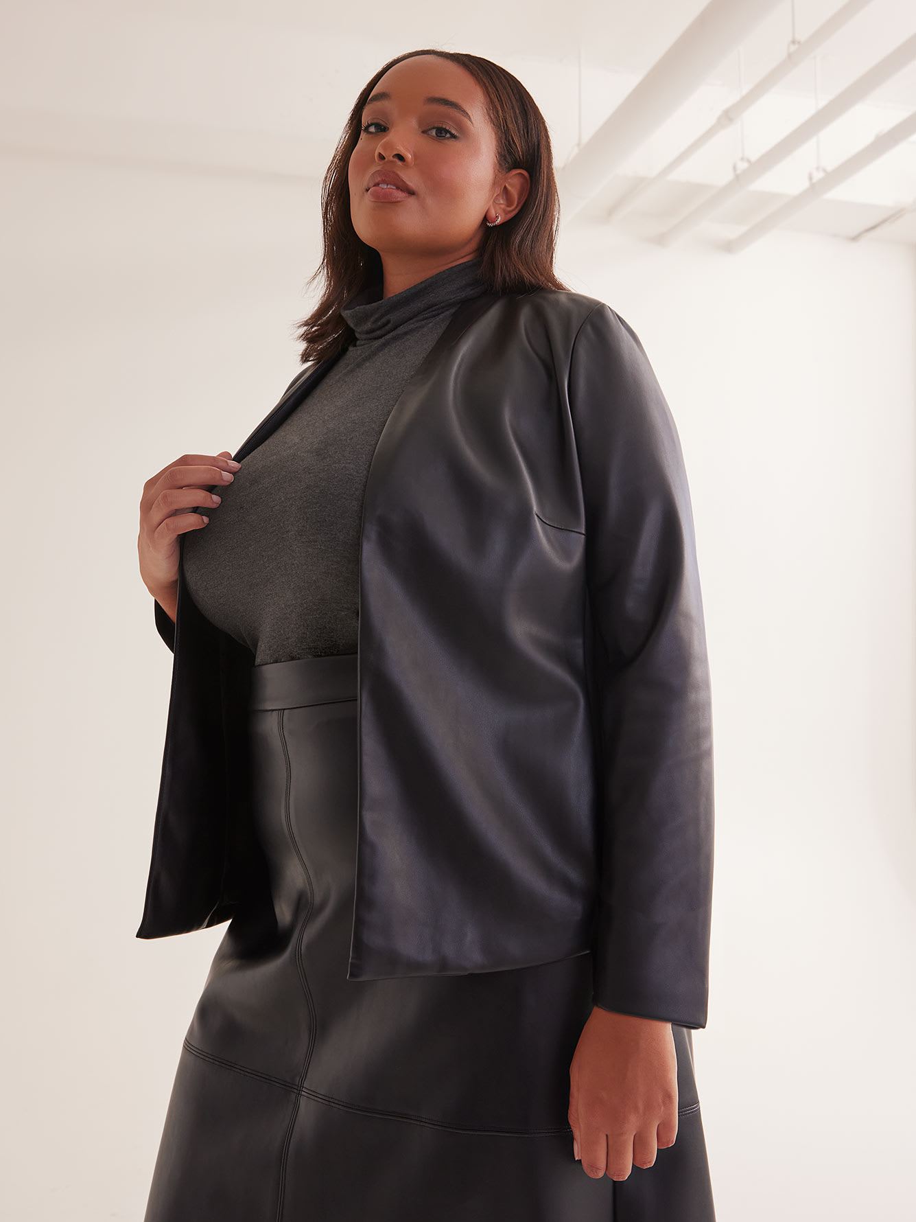 Black Faux Leather Jacket with Knit Inserts