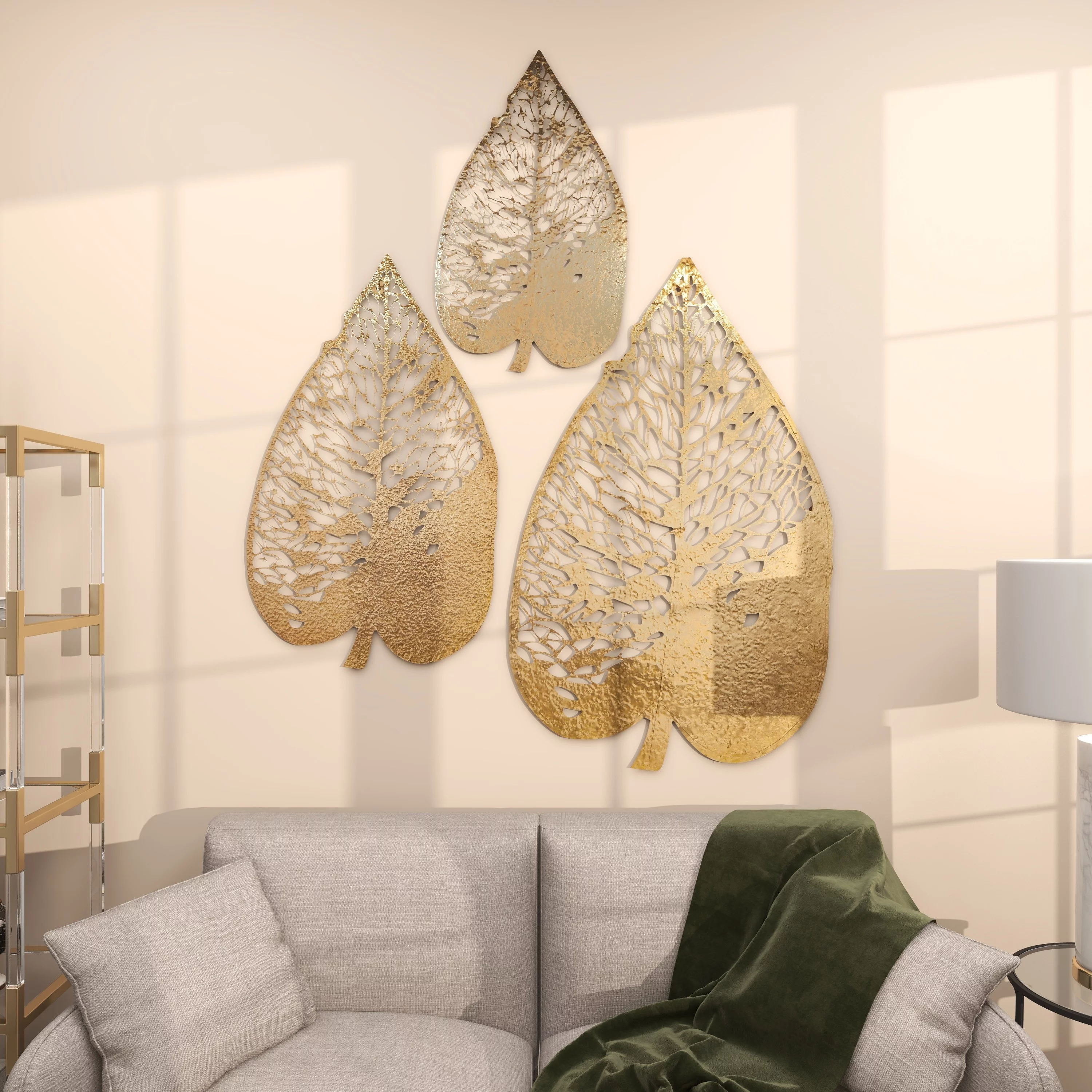 The Novogratz Gold Metal Leaf Wall Decor with Laser Cut Detailing (3 Count)