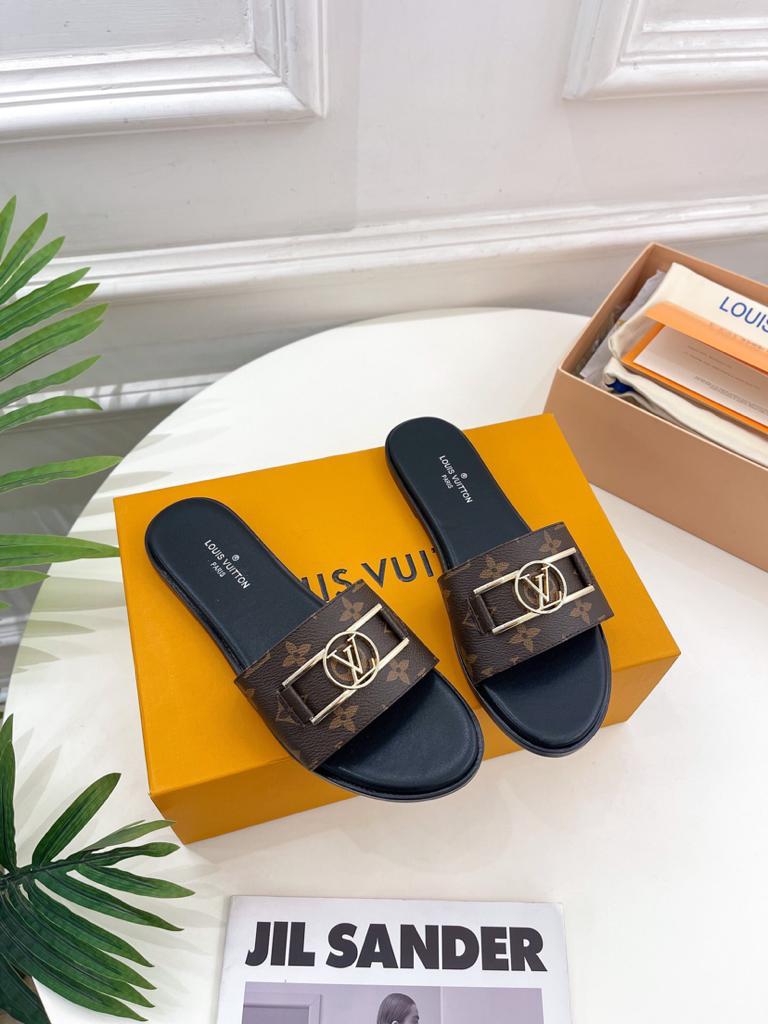 Louis Vuitton 1A64MK Lock it Flat Mule - vstockx