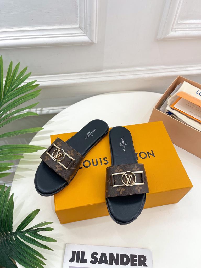 Louis Vuitton 1A64MK Lock it Flat Mule - vstockx