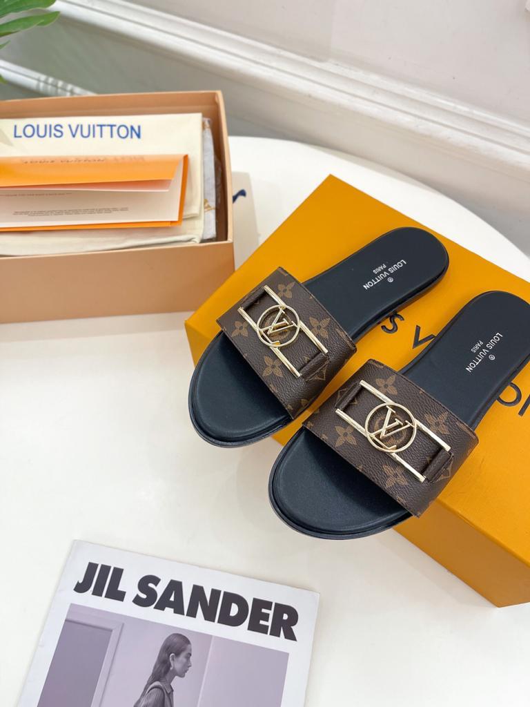 Louis Vuitton 1A64MK Lock it Flat Mule - vstockx