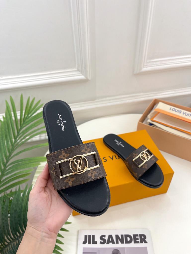 Louis Vuitton 1A64MK Lock it Flat Mule - vstockx