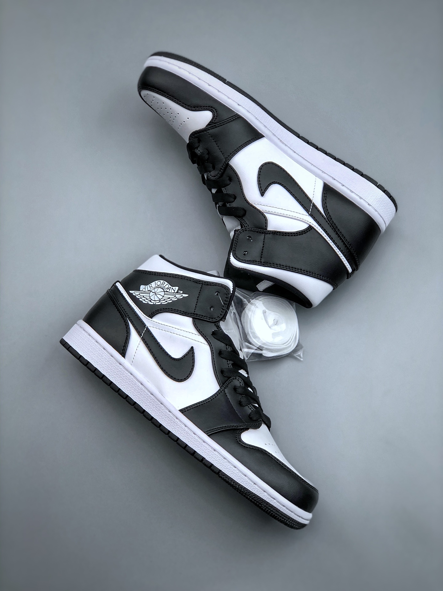 Jordan 1 Mid Panda (W) - vstockx