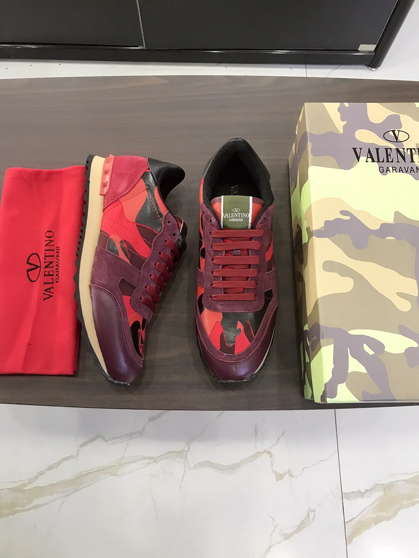 Valentino Garavani Rockrunner camouflage-print sneakers 1 - vstockx