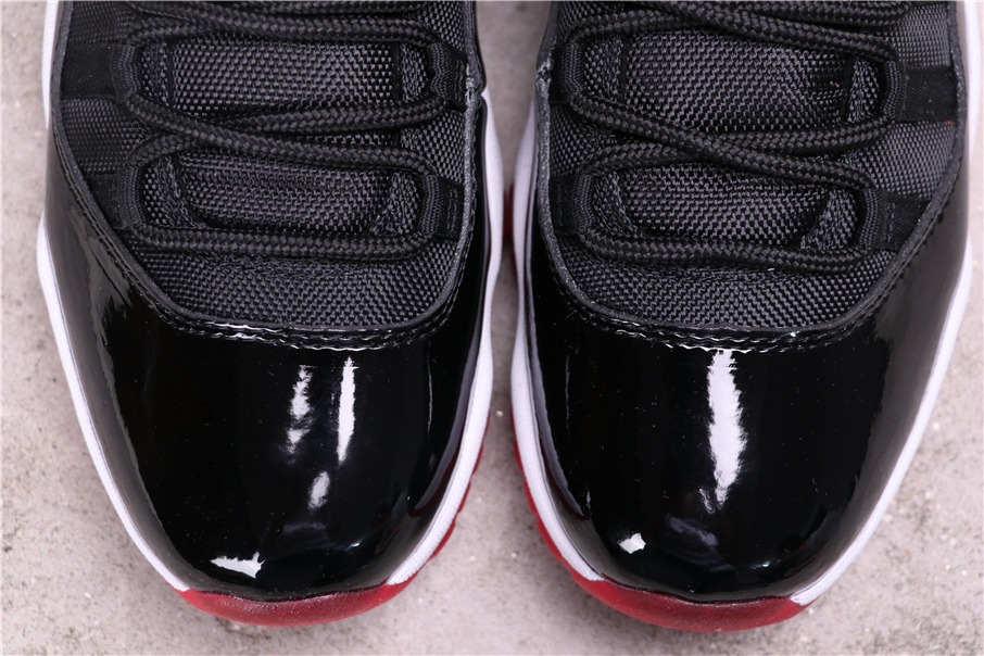 Jordan 11 Retro Low Bred - vstockx