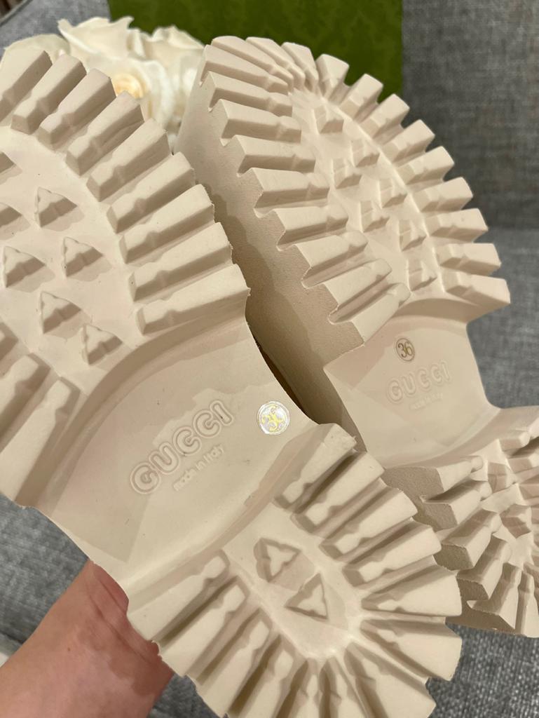 Gucci WOMEN'S PLATFORM PERFORATED G SANDAL - vstockx