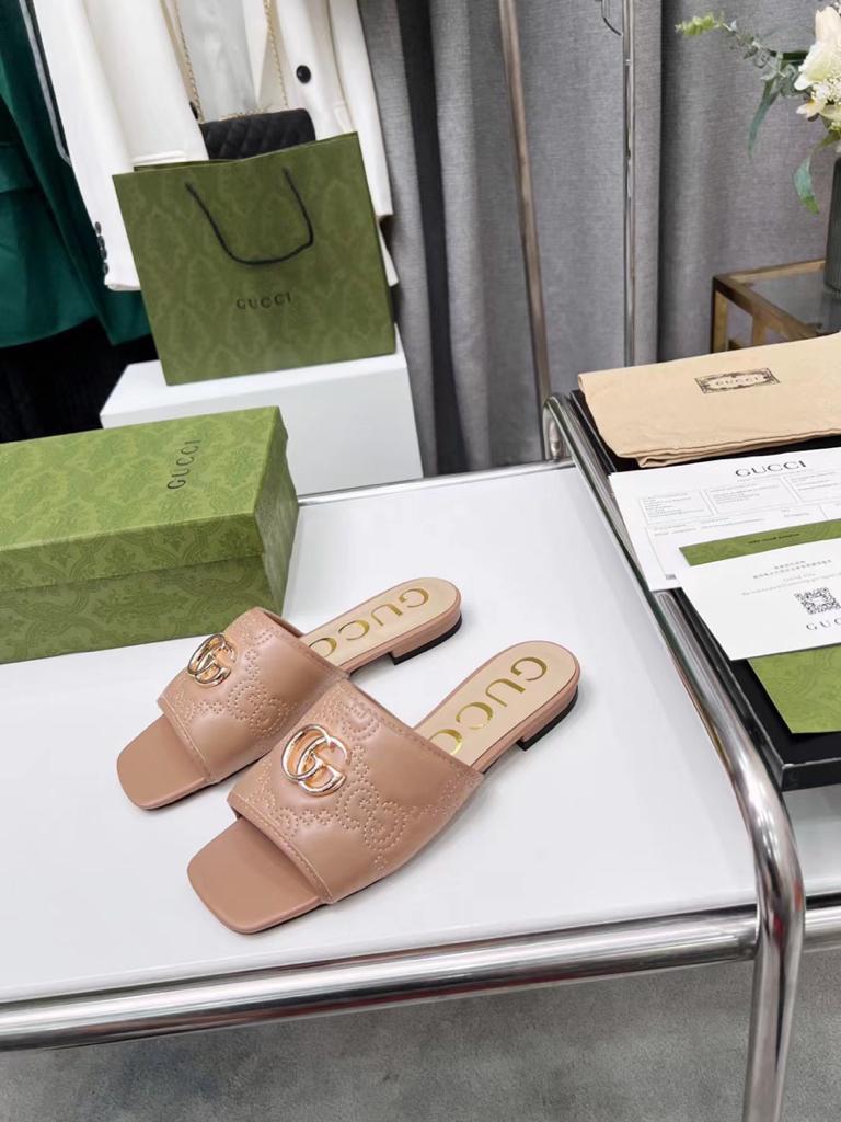 Gucci leather print slides Brown - vstockx