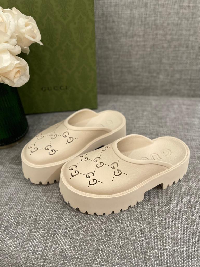 Gucci WOMEN'S PLATFORM PERFORATED G SANDAL - vstockx