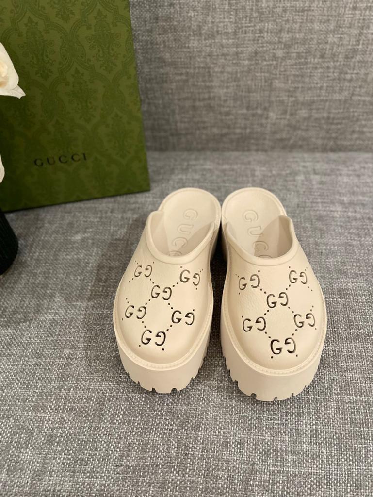 Gucci WOMEN'S PLATFORM PERFORATED G SANDAL - vstockx