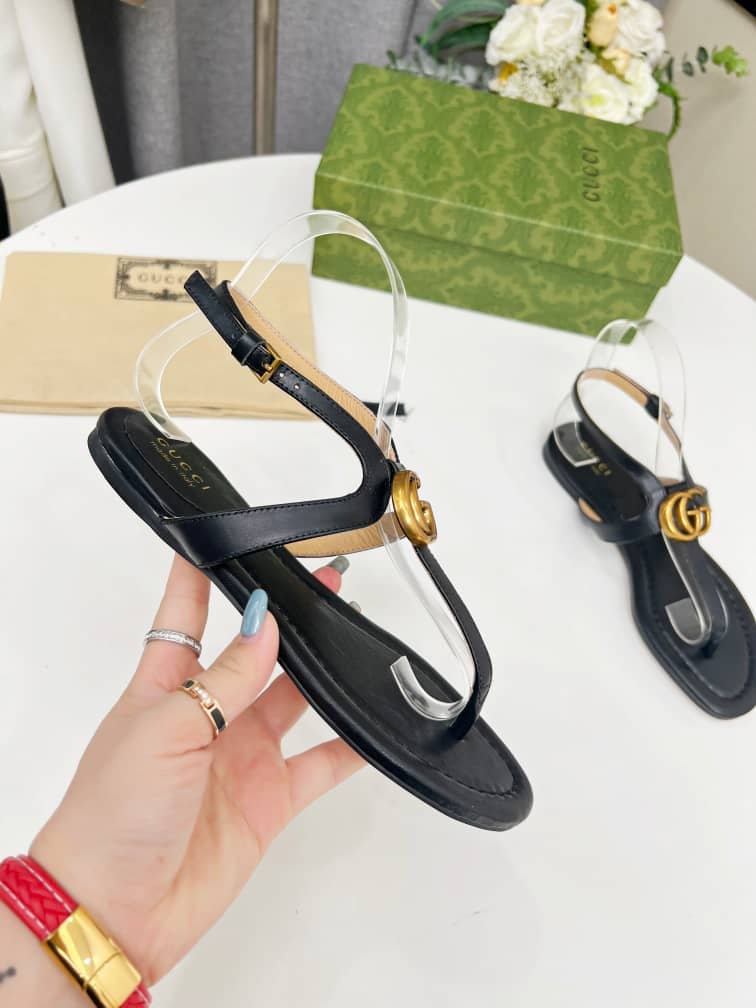 Gucci Women's Double G thong sandal Black leather - vstockx