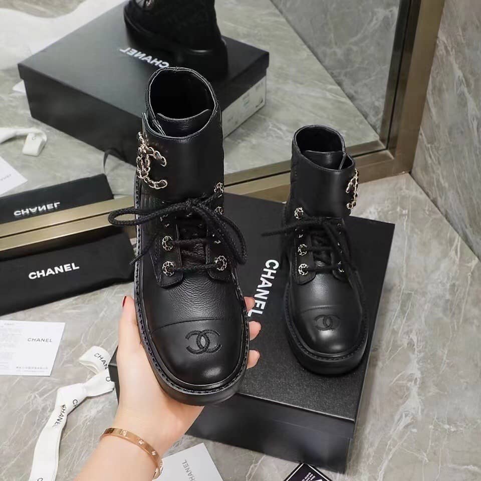 Chanel Quilted Combat Boot Black Leather - vstockx