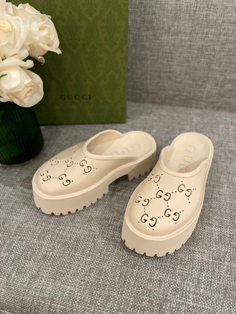 Gucci WOMEN'S PLATFORM PERFORATED G SANDAL - vstockx