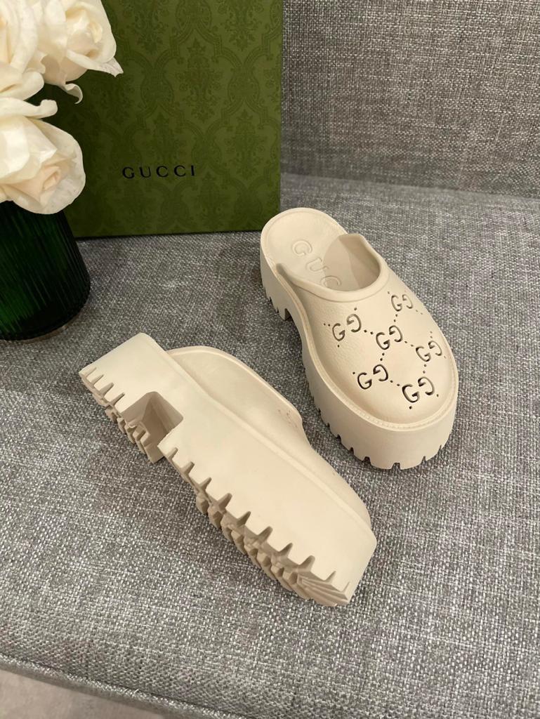 Gucci WOMEN'S PLATFORM PERFORATED G SANDAL - vstockx