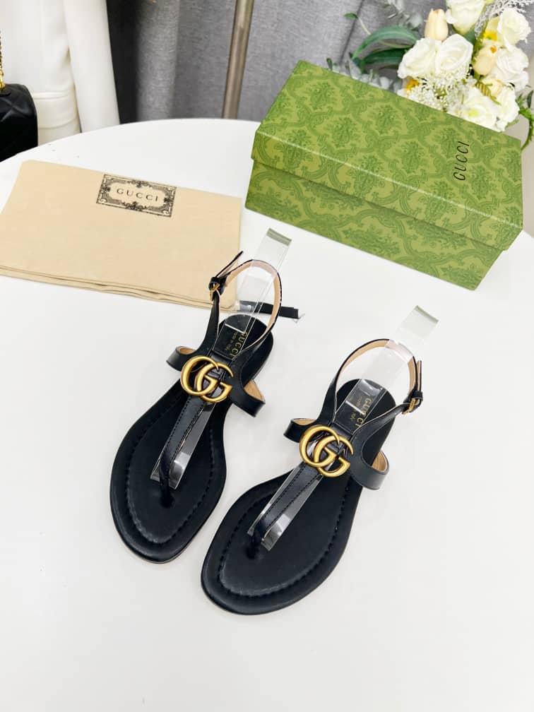 Gucci Women's Double G thong sandal Black leather - vstockx