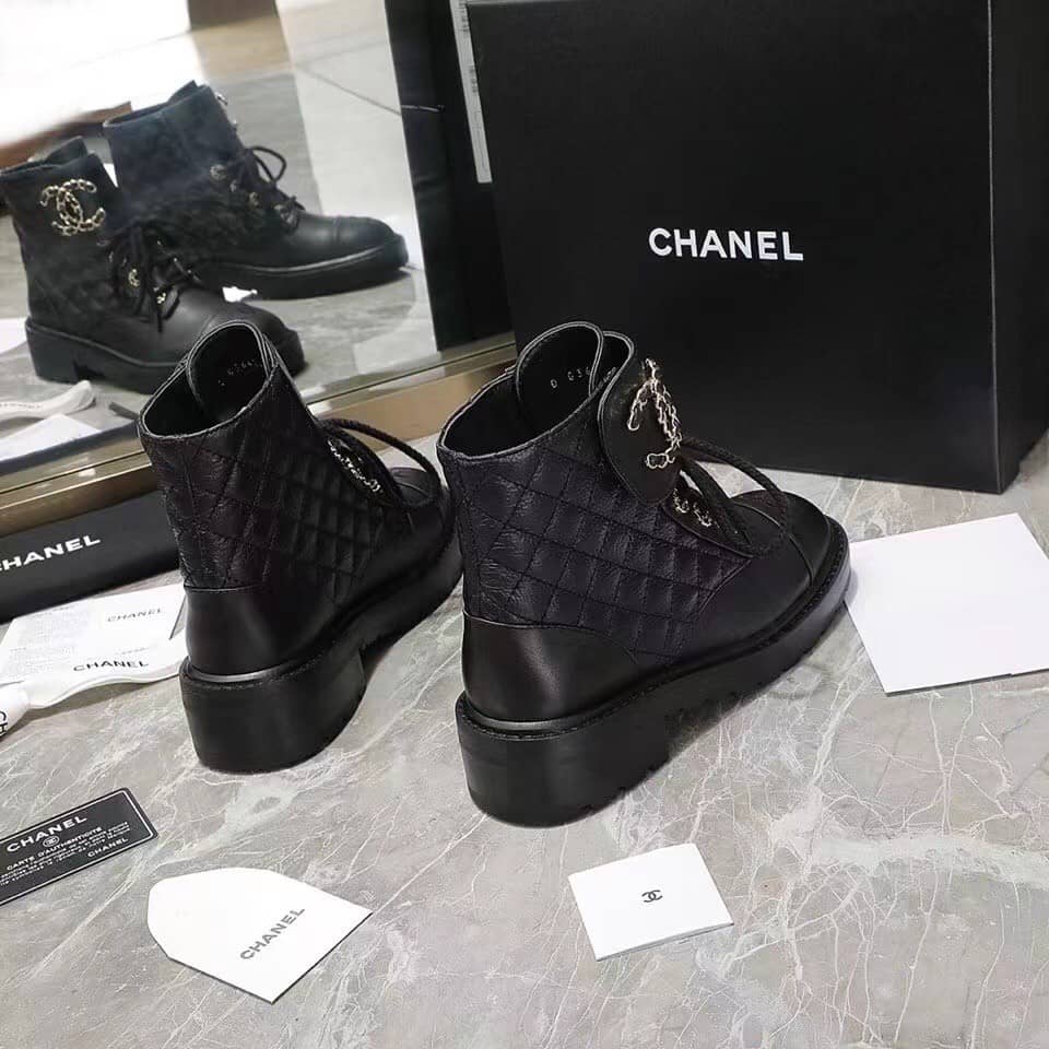 Chanel Quilted Combat Boot Black Leather - vstockx