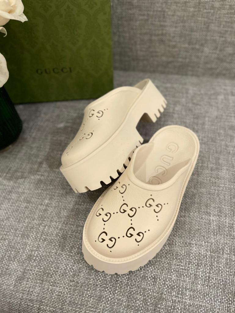 Gucci WOMEN'S PLATFORM PERFORATED G SANDAL - vstockx