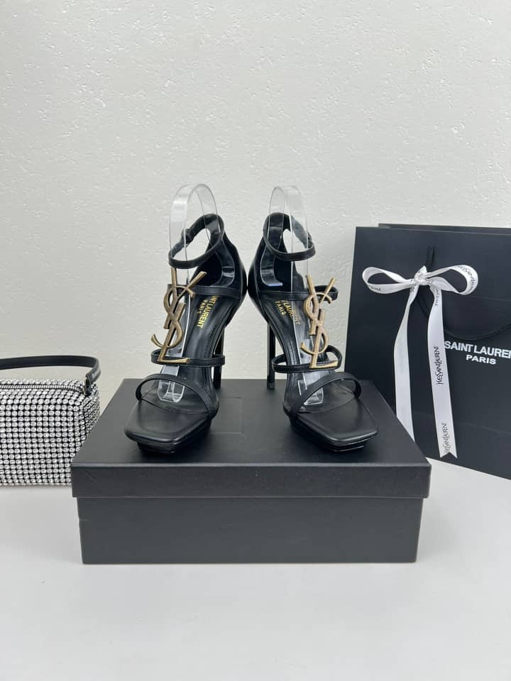 SAINT LAURENT CASSANDRA SANDALS IN PATENT LEATHER NOIR - vstockx