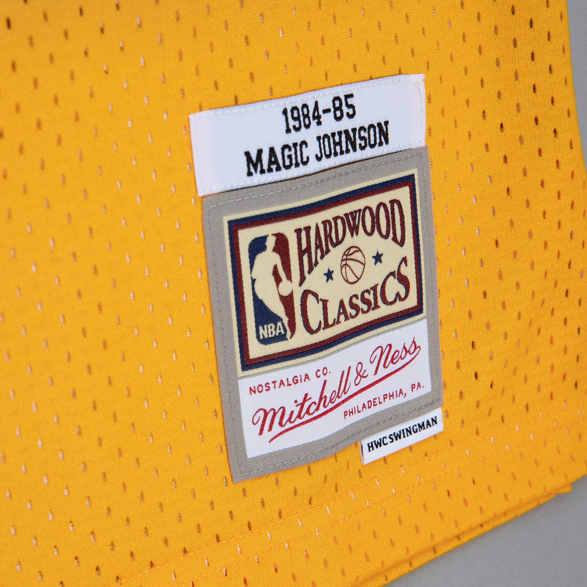 Magic Johnson Los Angeles Lakers Mitchell & Ness 1984/85 Hardwood Classics Fadeaway Swingman Player Jersey - Gold/Purple - vstockx