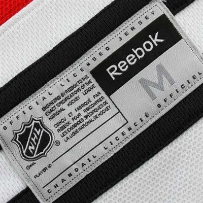 Chicago Blackhawks Mens Bobby Hull Premier Home Jersey with AUTHENTIC TACKLE-TWILL LETTERING - vstockx