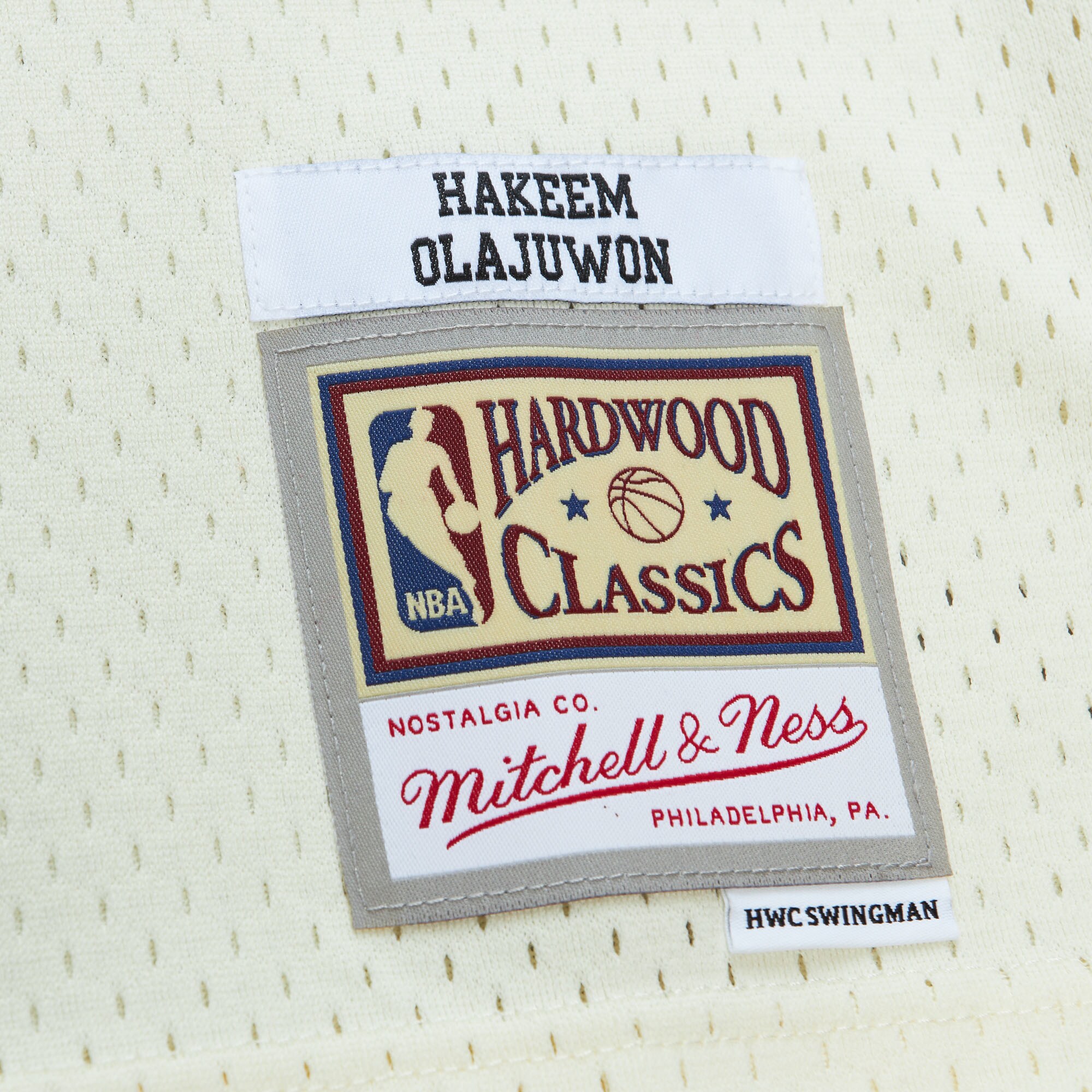 Hakeem Olajuwon Houston Rockets Mitchell & Ness Chainstitch Swingman Jersey - Cream - vstockx