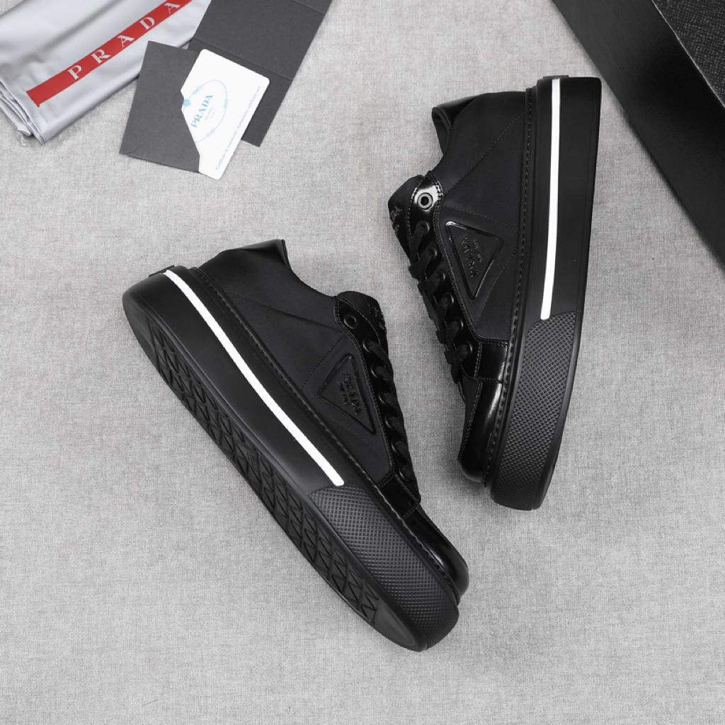 Prada Macro Re-Nylon and brushed leather sneakers Black - vstockx