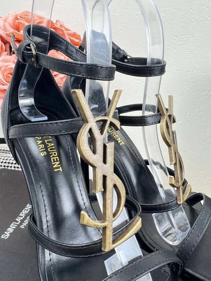 SAINT LAURENT CASSANDRA SANDALS IN PATENT LEATHER NOIR - vstockx