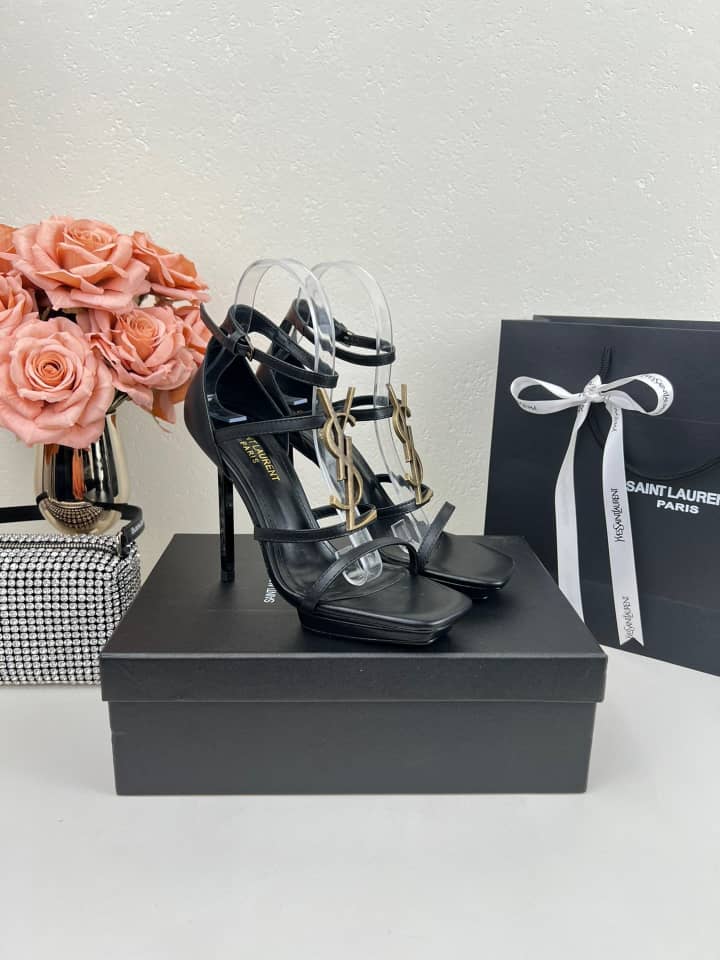 SAINT LAURENT CASSANDRA SANDALS IN PATENT LEATHER NOIR - vstockx