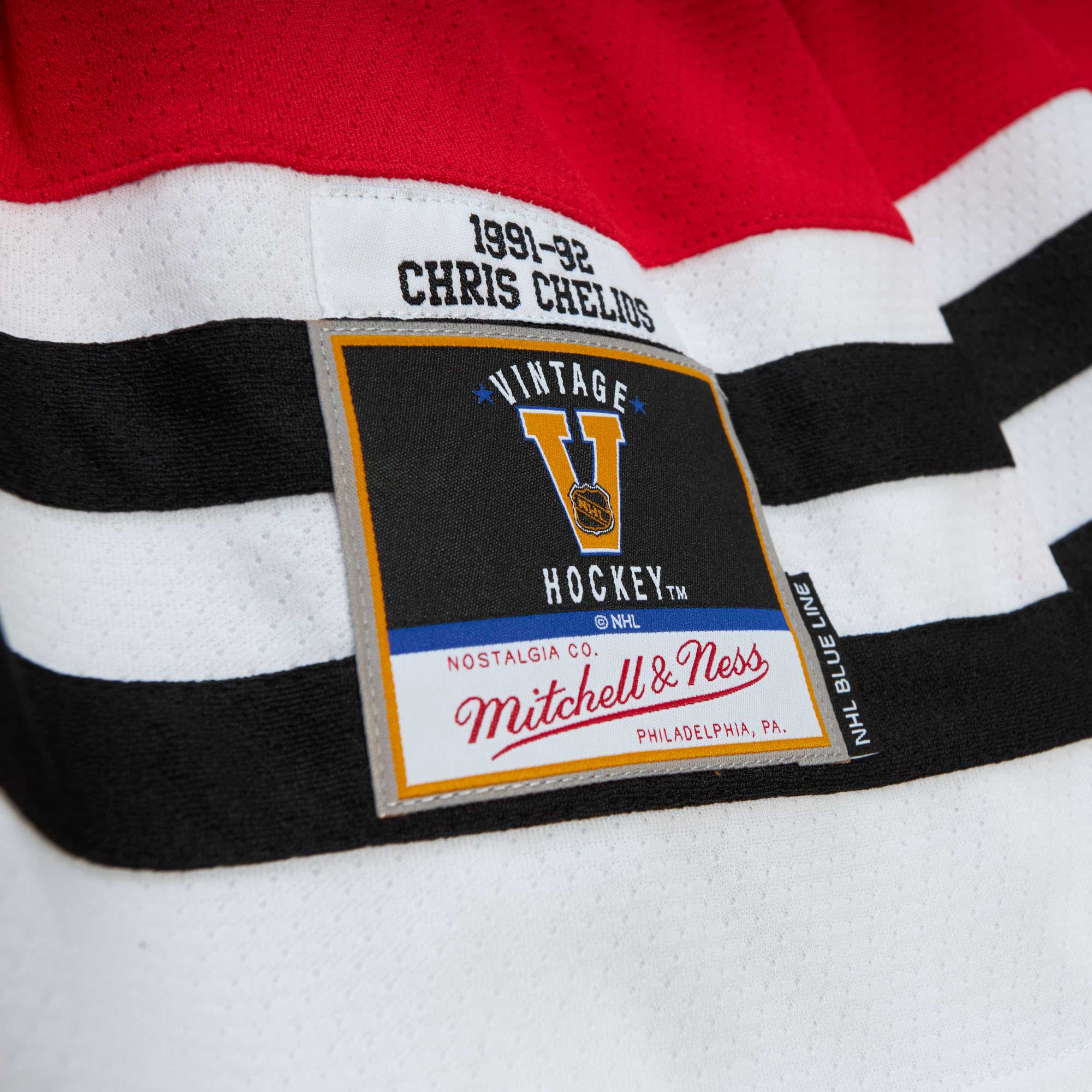 Chris Chelios Chicago Blackhawks Mitchell & Ness 1991/92 Alternate Captain Patch Blue Line Player Jersey - Red - vstockx