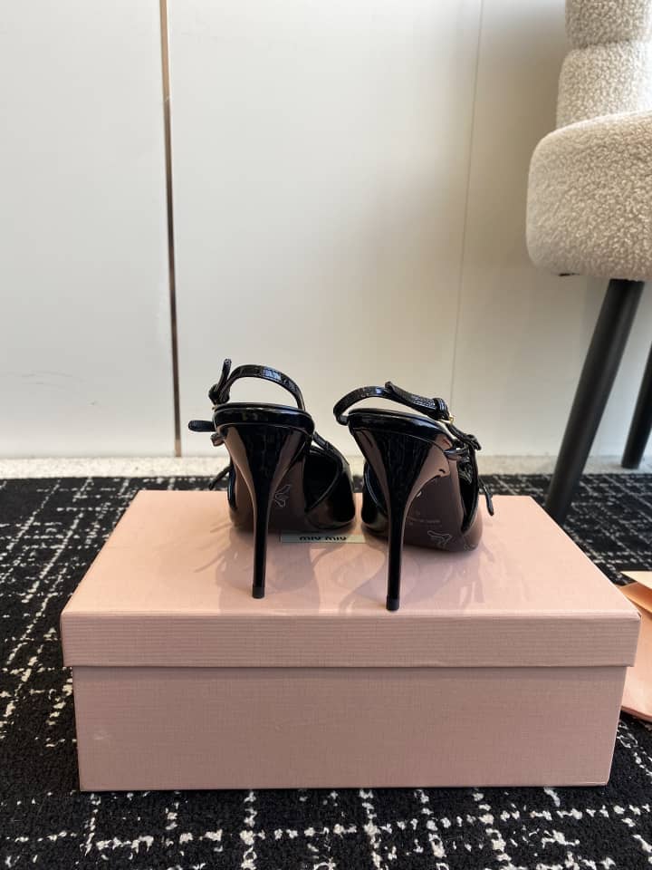 Miu Miu Patent leather slingbacks with buckles Black - vstockx