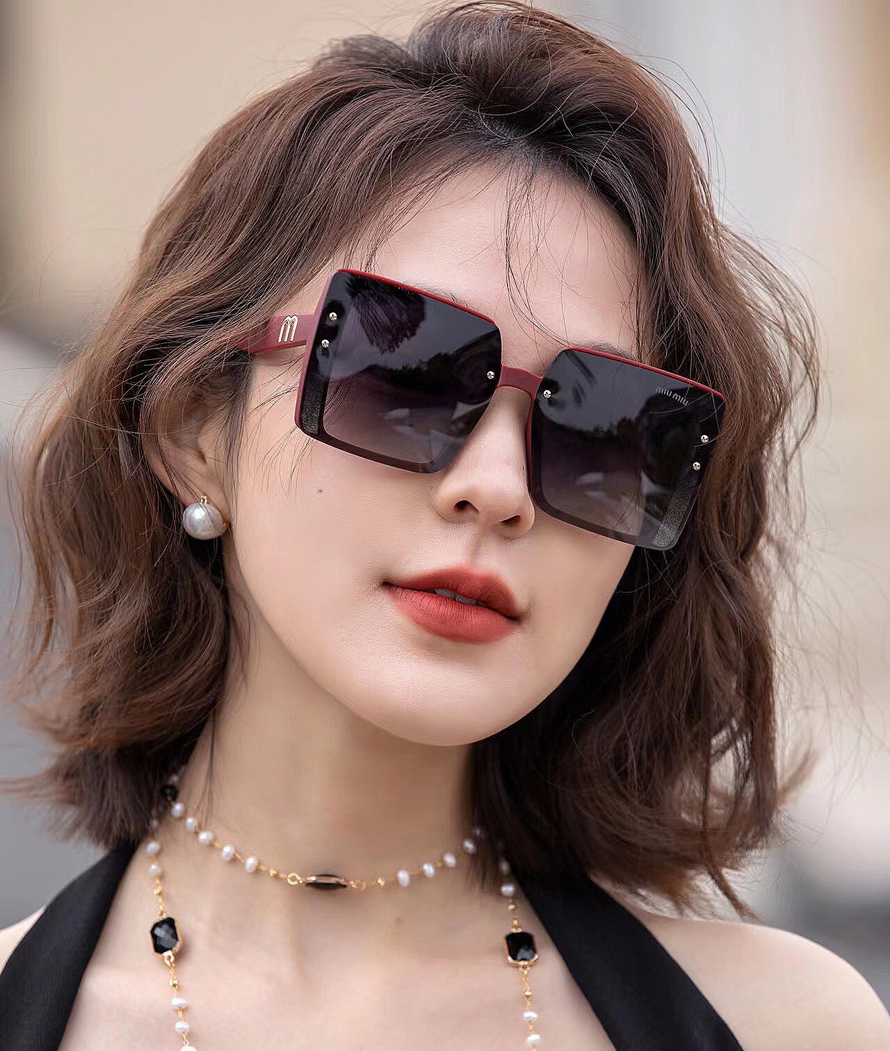 sunglasses Miu Miu MM1045 - vstockx