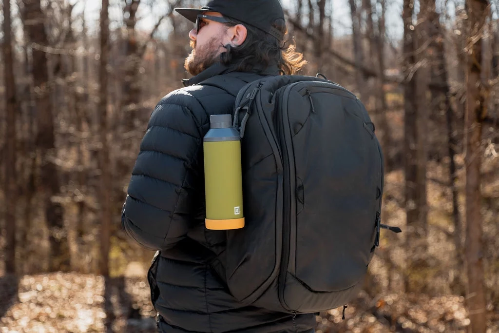 Swiss Tech Stainless Steel Insulated Water Bottle with Leakproof Chug Lid, Carabiner Clip Handle and Silicone Boot, 24oz, Soft Touch Green