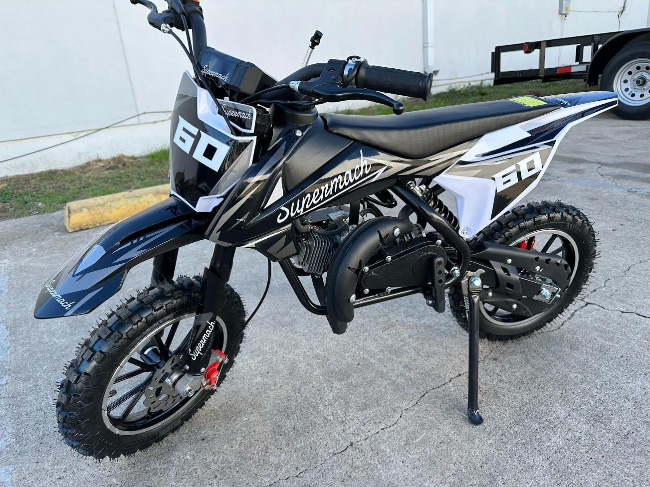 Supermach 49CC 2-Stroke Gas Power Mini Dirt Bike Dakar Pit Bike  GB60 for Youth and Kids-Black