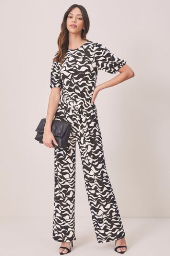 Outlet Lipsy Monochrome Puff Sleeve Tie Waist Jersey Jumpsuit UK 6