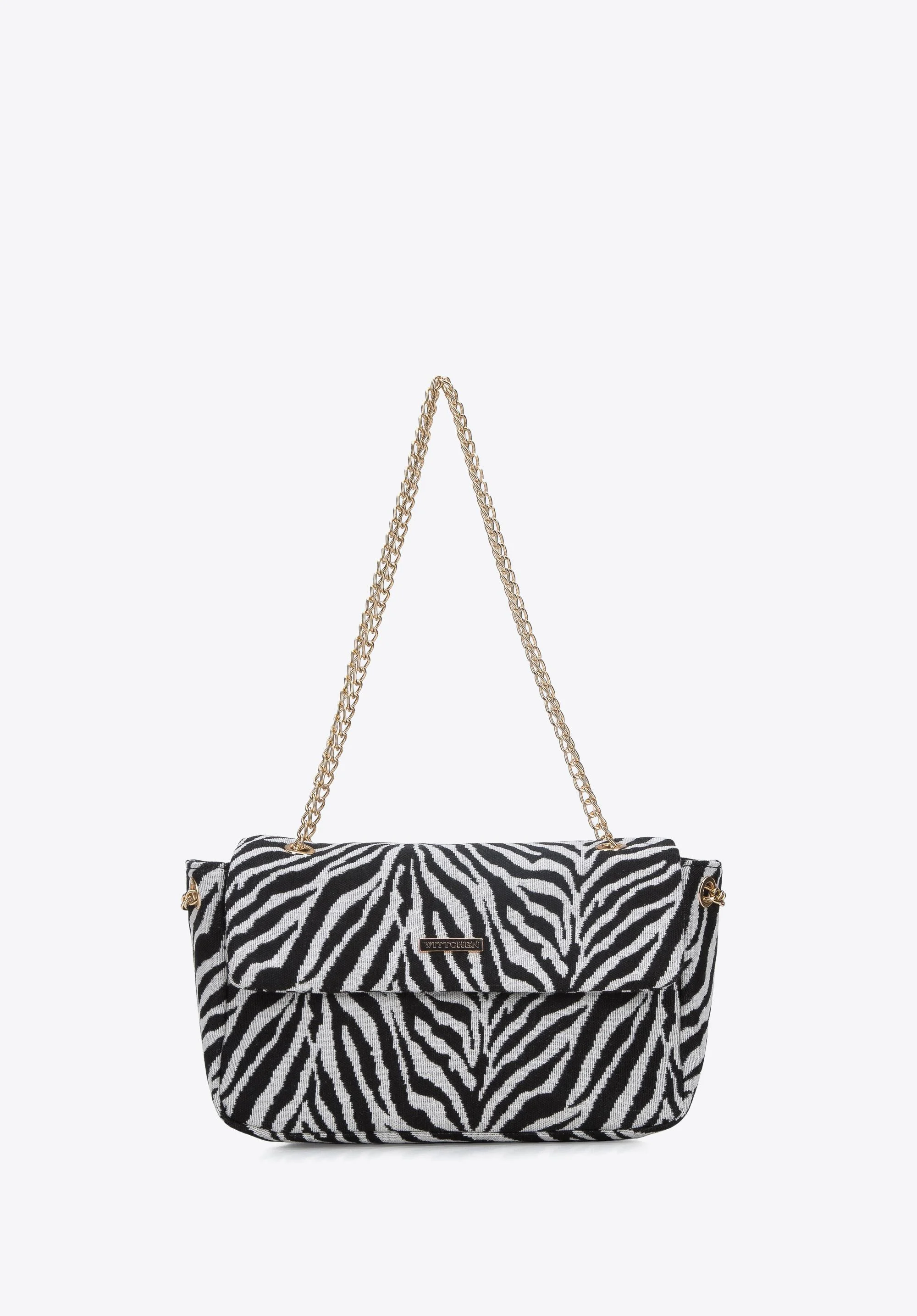 Damska torebka w zebrę na łańcuszku