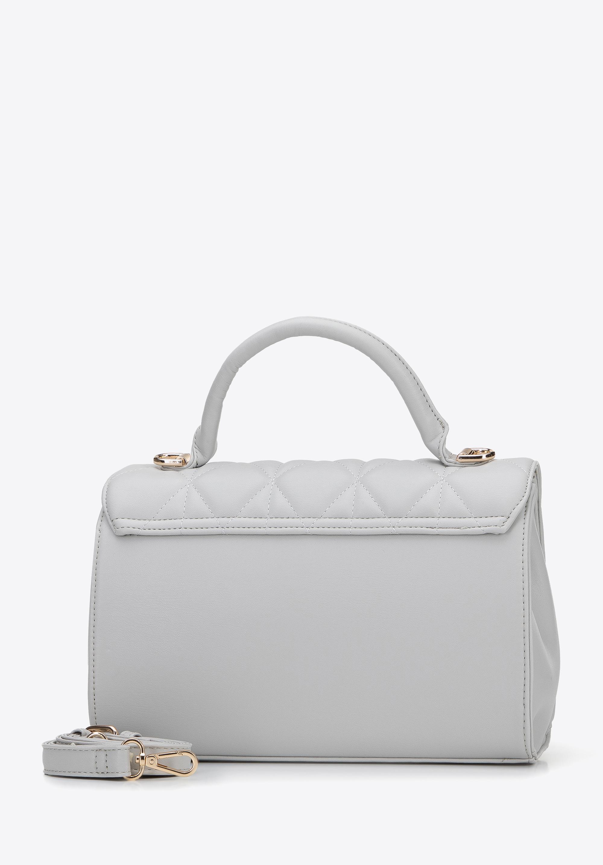 Torebka kuferek z pikowanej ekoskóry z nitami