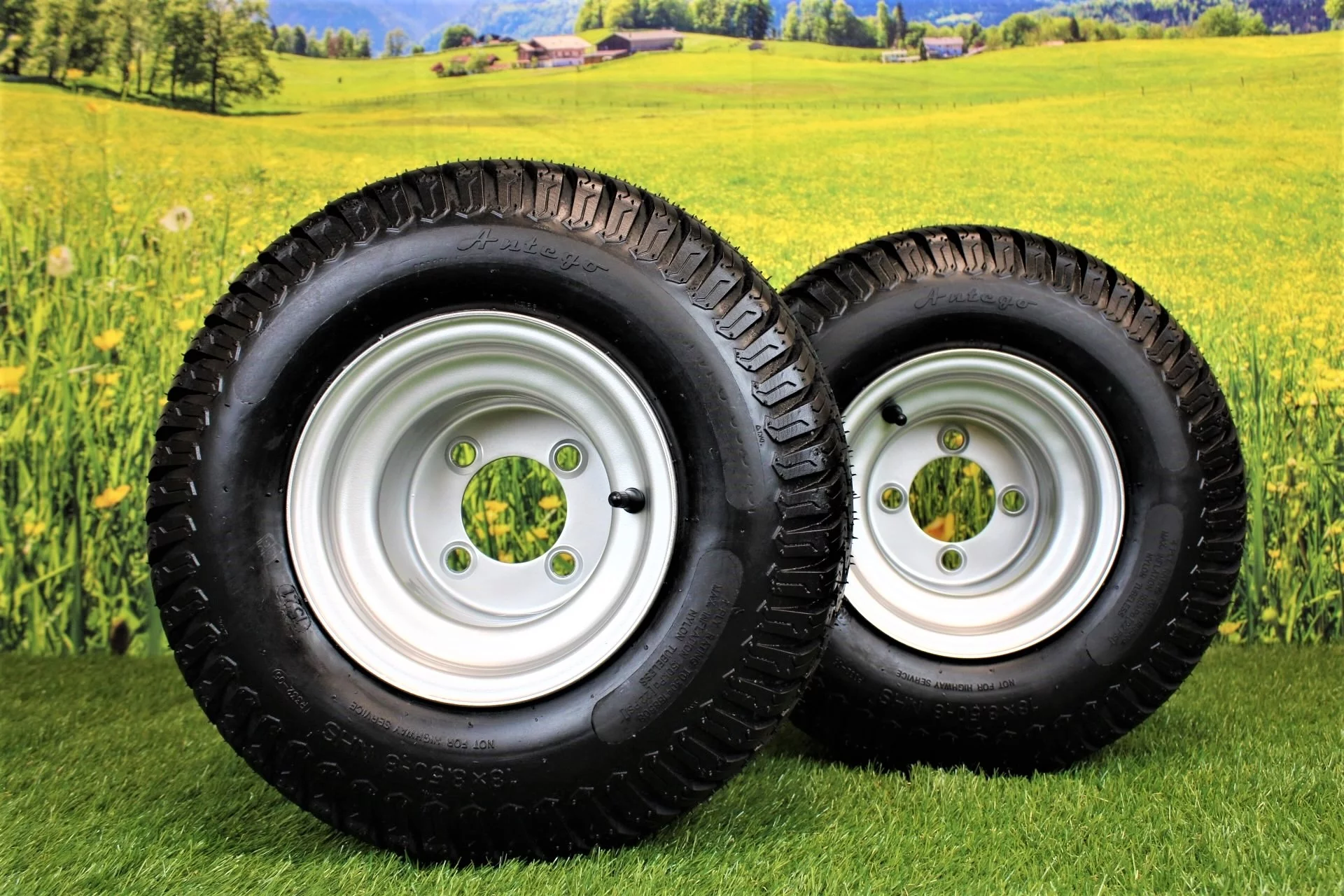 Antego Tire and Wheel (Set of 2) 18x8.50-8 with 8x7 Hustler Chrome Silver Assembly