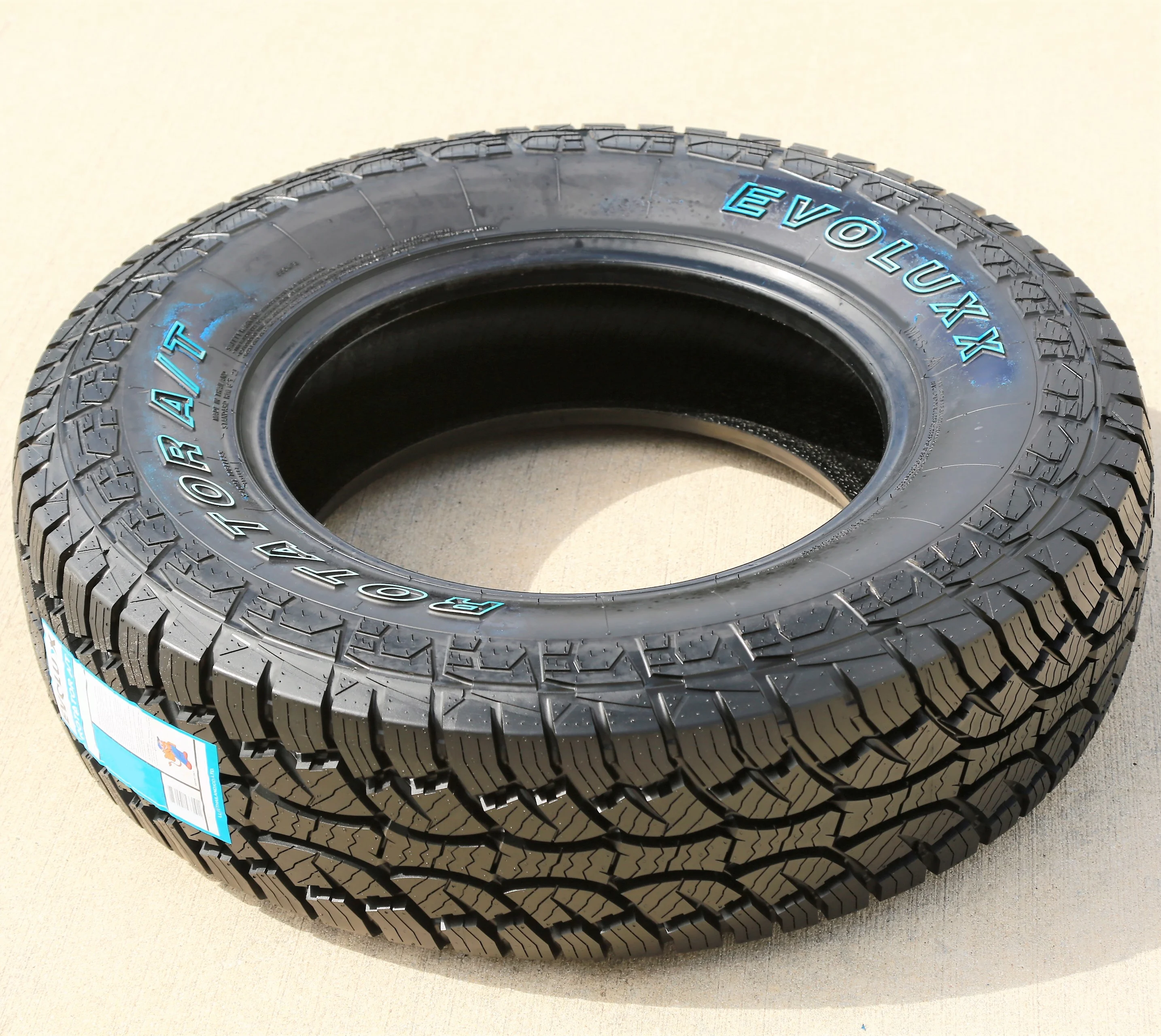 Tire Evoluxx Rotator A/T LT 275/65R18 Load E 10 Ply (OWL) AT All Terrain