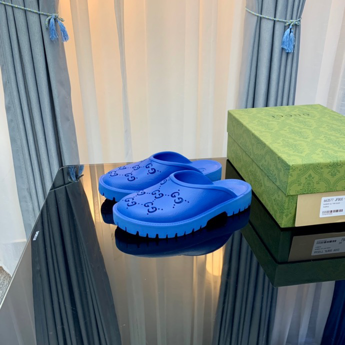 Gucci Perforated GG Thin Sole Mules Blue