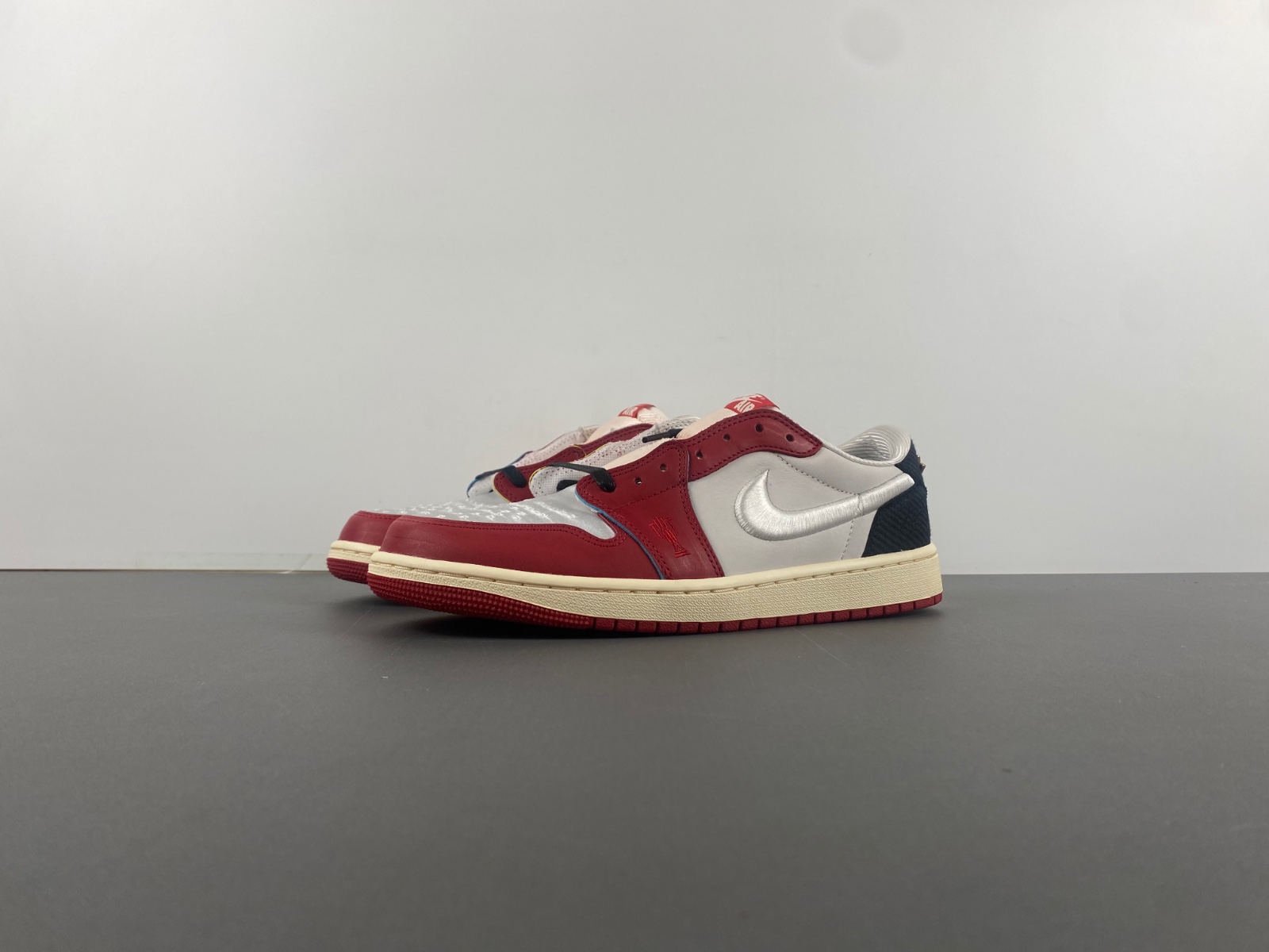 Air Jordan 1 Low OG x Trophy Room Sail and Varsity Red FN0432-017
