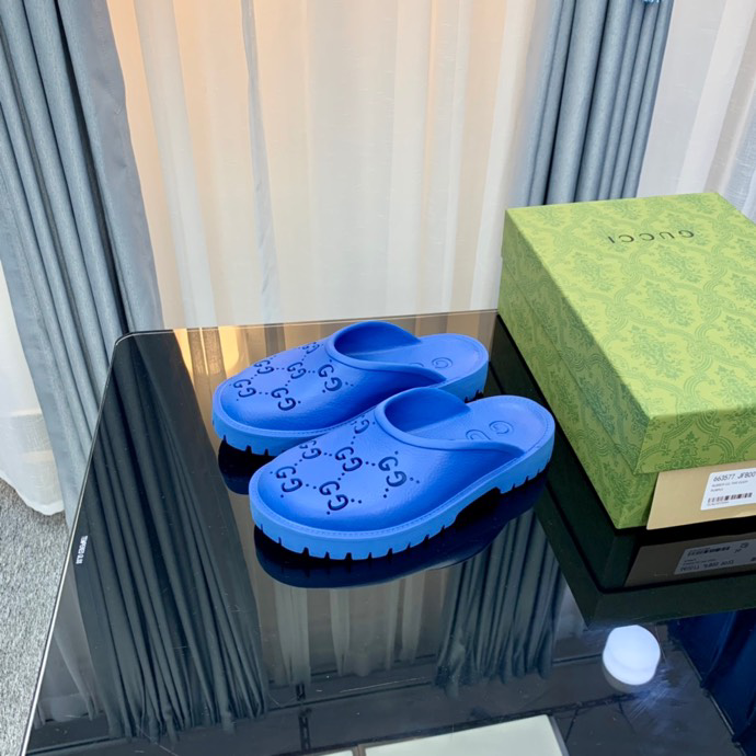 Gucci Perforated GG Thin Sole Mules Blue