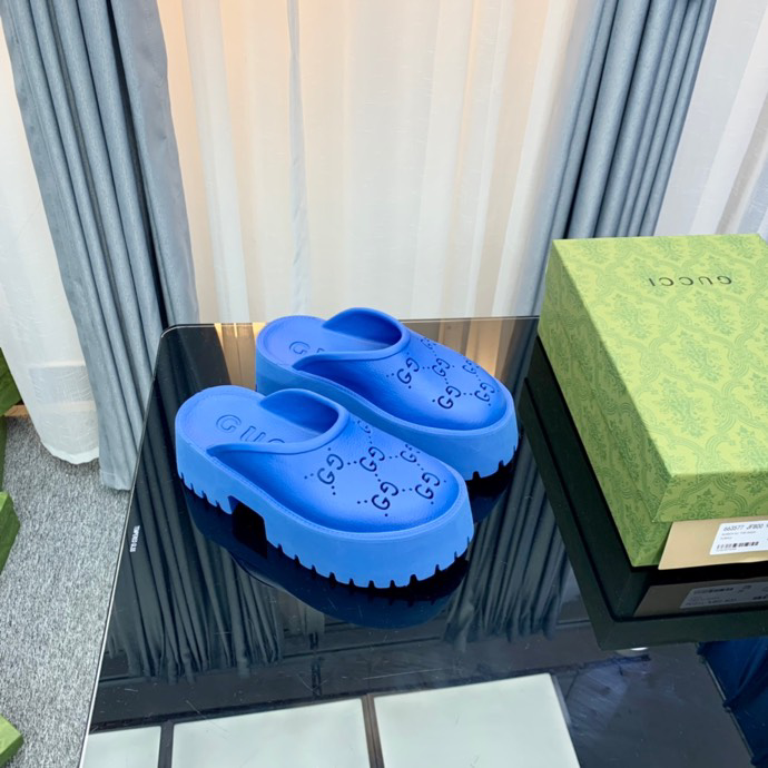 Gucci perforated GG platform mules Blue