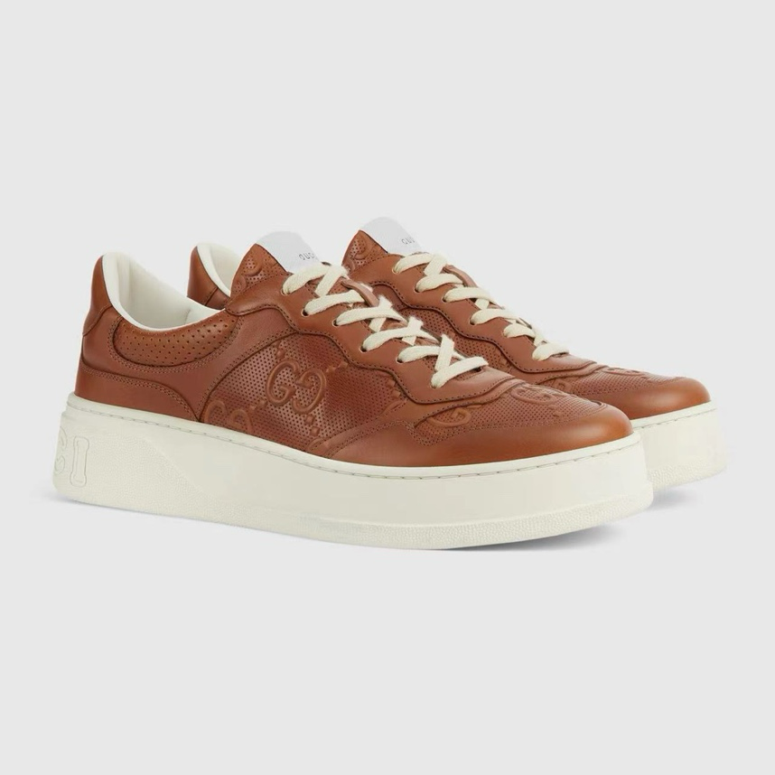 Gucci GG embossed sneakers Brown