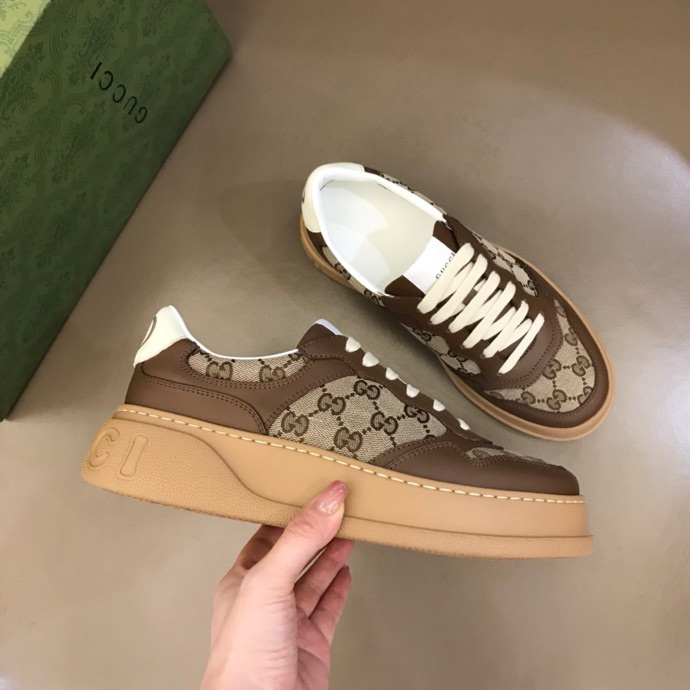 Gucci GG embossed sneakers Brown